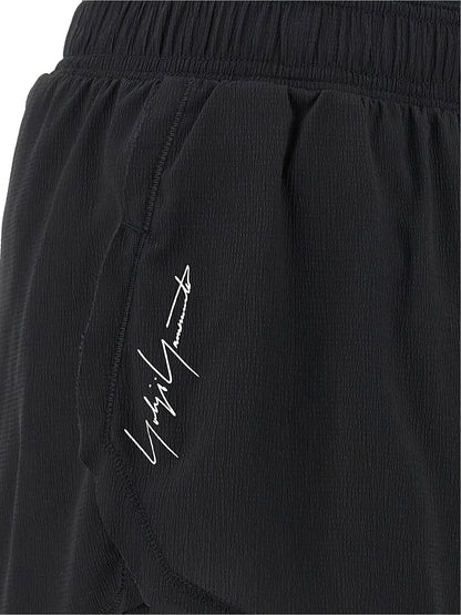 Bermuda Shorts by Y-3 for women in stretch polyamide black & print features a eye catching athletic & wide and short with a eye catching .