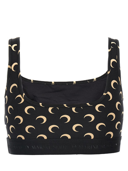 This Sport Bra by Marine Serre for women in stretch polyamide black & print features a contemporary silhouette that elegantly showcases the contemporary design of the Women's Stretch Polyamide Sport Bra with a contemporary fit.