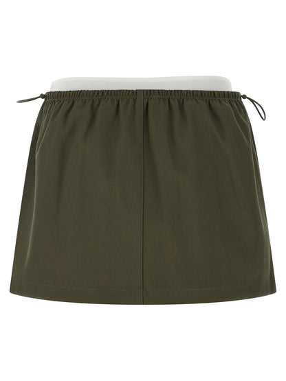 Skirt by Alexander Wang for women in cotton bicolour & green showcases a sultry silhouette, elegantly defined by its mini long and the sophisticated sultry design of the Women's Cotton Skirt.