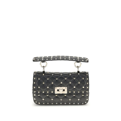Mini Quilted Handbag by Valentino Garavani for women in bos taurus calf nappa leather black & signature features an refined silhouette, showcasing a secure , ample , and versatile handle & detachable-strap for a sophisticated refined aesthetic.