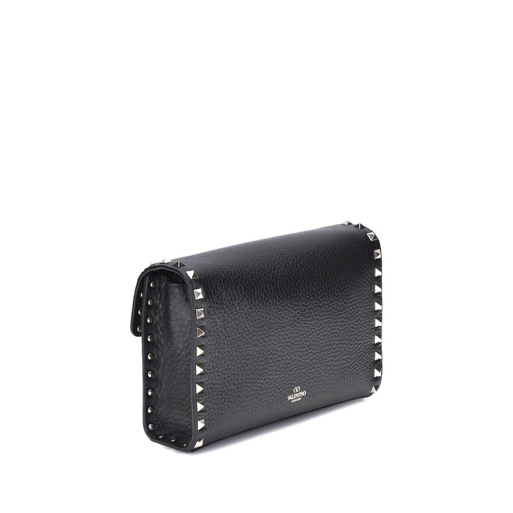 Mini Shoulder Bag by Valentino Garavani for women in bos taurus calfskin leather black & signature presents a versatile silhouette, showcasing a secure hook and versatile with versatile shoulder-strap, adjustable-strap & handle for a sophisticated look.