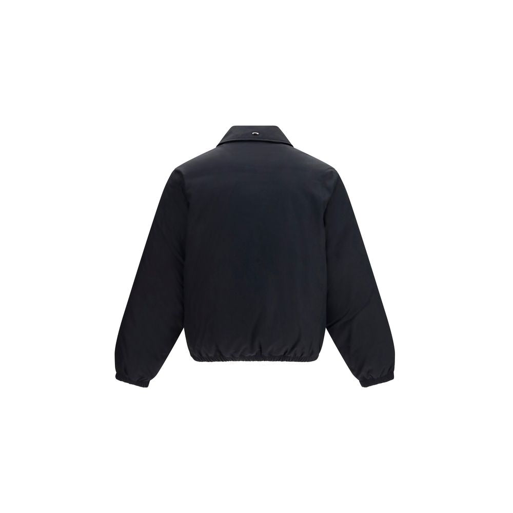 Overcoat by Our Legacy for men in nylon polyester cotton & goose-down black & signature showcases a architectural silhouette, artfully detailed with a distinctive and functional pockets & insulated for a architectural finish.