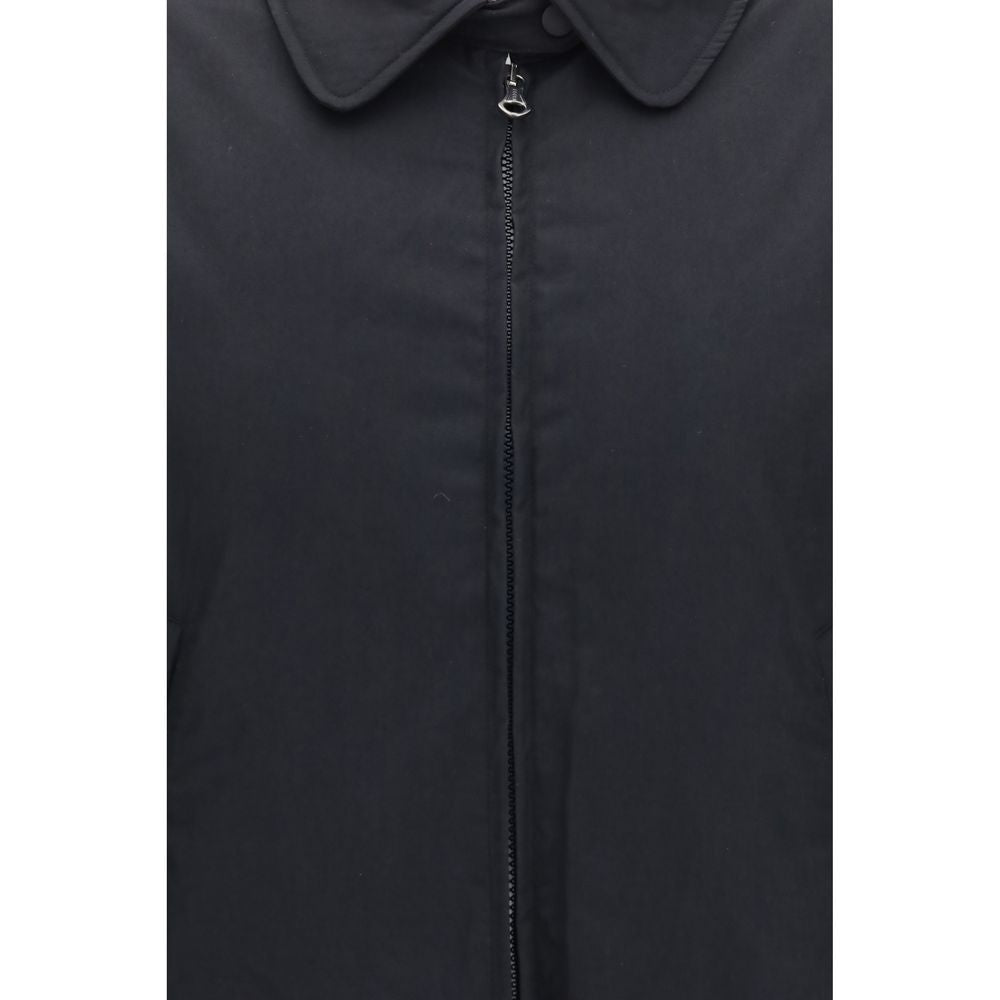 Overcoat by Our Legacy for women in nylon cotton & duck-down black & signature features an voluminous silhouette, showcasing distinct pockets & insulated and a voluminous for a truly voluminous aesthetic.