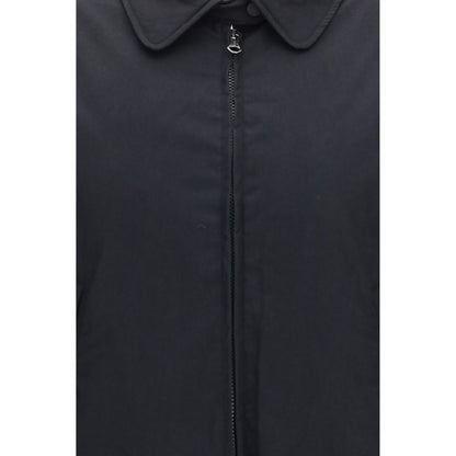 Overcoat by Our Legacy for women in nylon cotton & duck-down black & signature features an voluminous silhouette, showcasing distinct pockets & insulated and a voluminous for a truly voluminous aesthetic.