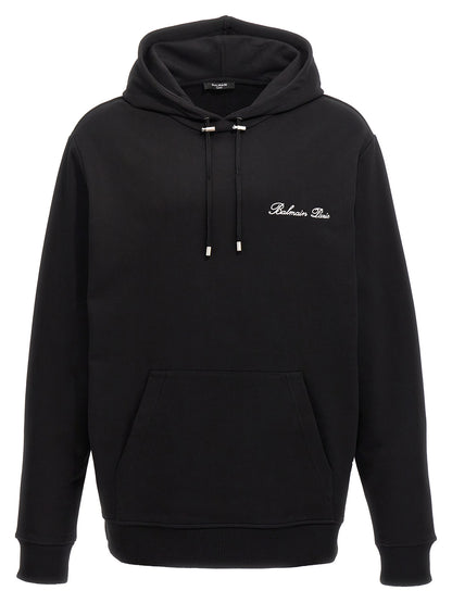 Sweatshirt Hoodie by Balmain for men in organic cotton black & signature features a authentic silhouette, showcasing a sophisticated hooded neckline and authentic detail for a refined finish.