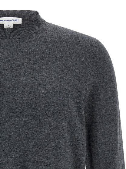 Cardigan by Comme Des Garçons for men in nylon wool & acetate gray presents a textural silhouette, artfully finished with a textural crew neckline and for a sophisticated, textural look.