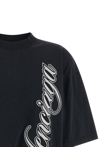 T-Shirt by Balenciaga for women in cotton black showcases a fashionable silhouette, elegantly detailed with a fashionable and for a sophisticated, high-fashion look.
