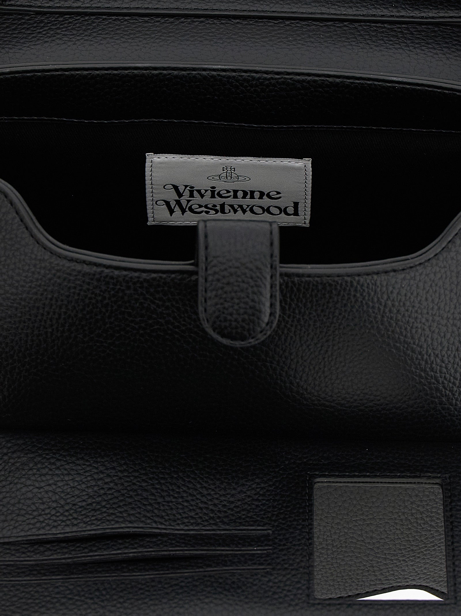 Shoulder Flap Bag by Vivienne Westwood for women in polyethylene polyurethane leather black showcases a enviable silhouette, artfully detailed with a secure flap & magnetic, organized , and versatile shoulder-strap & handle for a enviable look.
