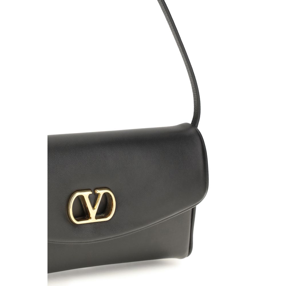 Compact Shoulder Bag by Valentino Garavani for women in bio-acetate & bos taurus nappa calfskin leather brown & signature features a effortless sophistication silhouette, secured by a magnetic with ample single-compartment and versatile shoulder-strap, adjustable-strap & handle for a effortless sophistication finish.