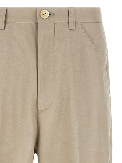 Trousers by Brunello Cucinelli for men in linen & cotton brown features an on trend silhouette, showcasing a sophisticated tapered-leg with a long and for an on trend finish.