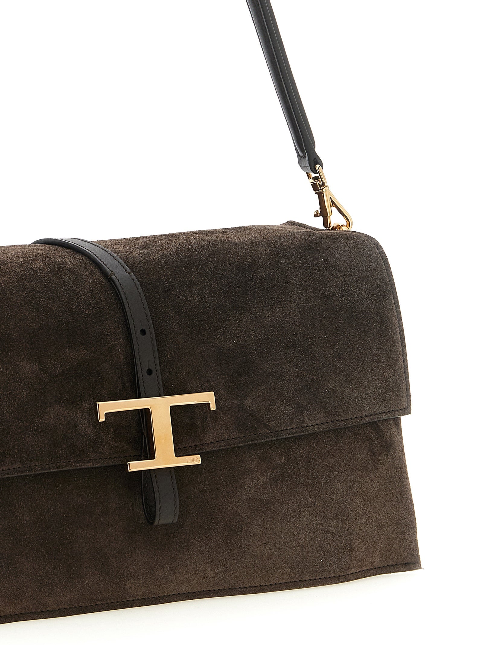 Small Shoulder Flap Bag by Tod's for women in suede calfskin leather brown, gold & signature features an effortlessly chic silhouette with a secure flap & magnetic, ample , and versatile shoulder-strap, adjustable-strap, detachable-strap & handle for effortlessly chic everyday luxury.