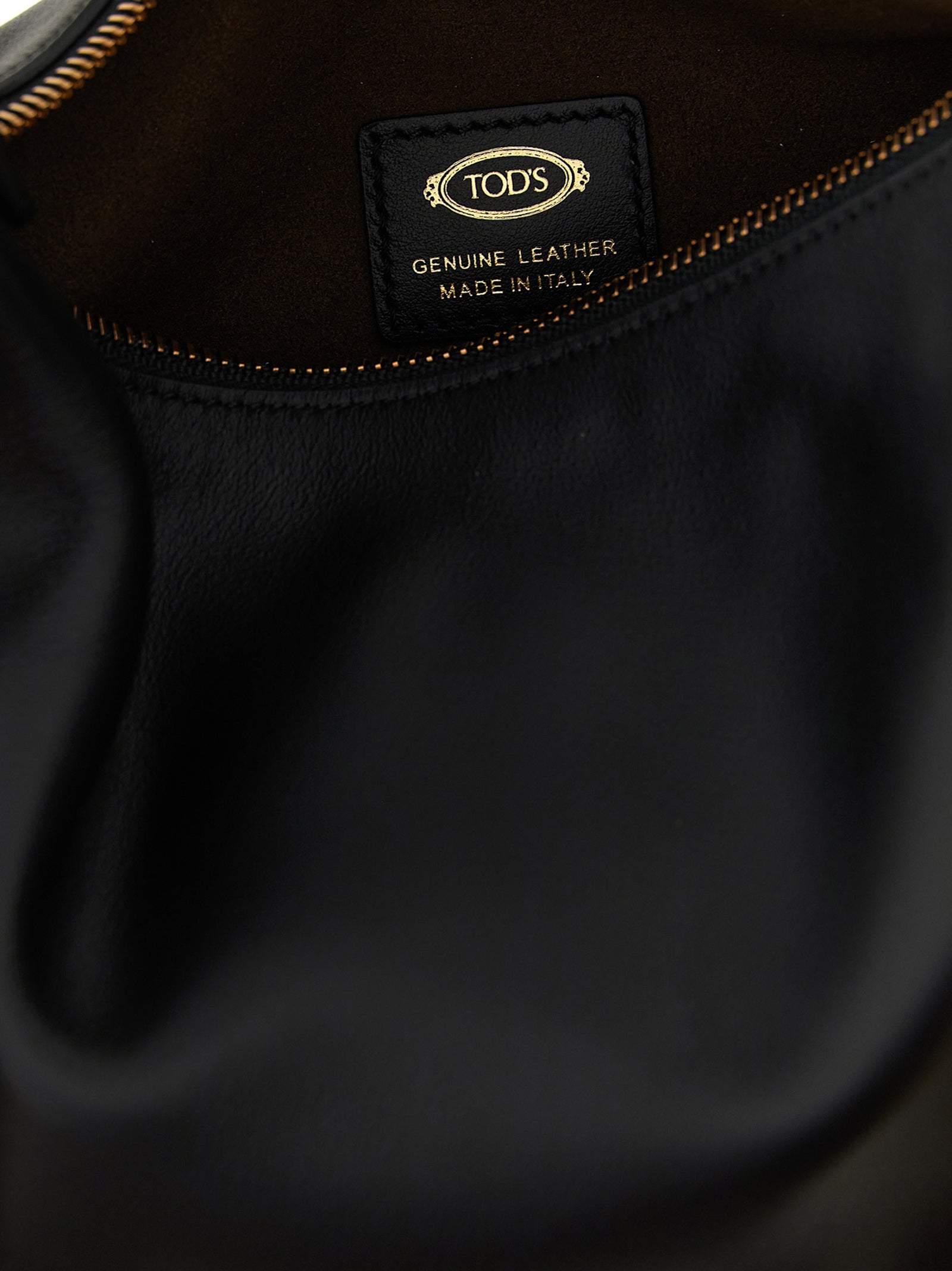 Mini Shoulder Hobo Bag by Tod's for women in bos taurus calfskin leather black, gold & signature showcases a enviable silhouette, artfully detailed with a secure zipper, organized , and versatile shoulder-strap, adjustable-strap & handle for a enviable look.