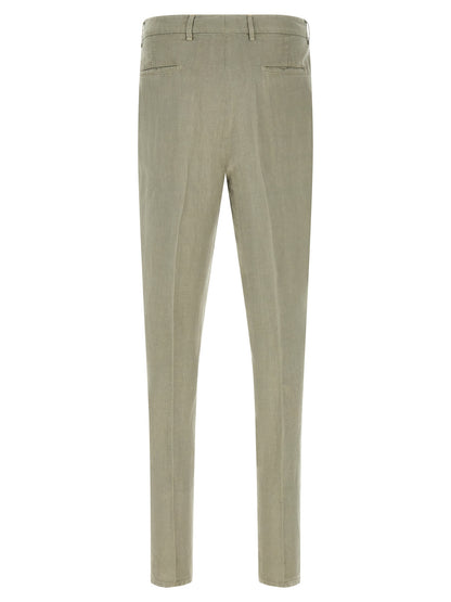 Trousers by Brunello Cucinelli for men in linen bicolour, green, horn, olive & signature presents a perennial silhouette, meticulously tailored with a tapered-leg & relaxed-fit cut, long finish, and an elegant .