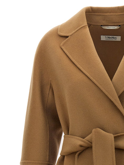 Trench Coat by S Max Mara for women in wool beige features an dramatic silhouette, perfectly showcasing the elegant and sophisticated for a truly dramatic aesthetic.