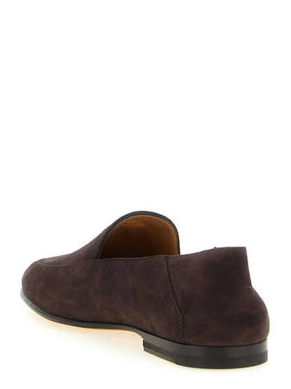 Flat Moccasin Moccasins Loafer Slip-On Slippers Shoes by Tod's for women in suede goatskin leather brown & gold features an effortless chic silhouette, showcasing the Women's Suede Goatskin Leather Flat Moccasin Moccasins Loafer Slip-On Slippers Shoes design with an effortless chic flat and a for a effortless chic look.