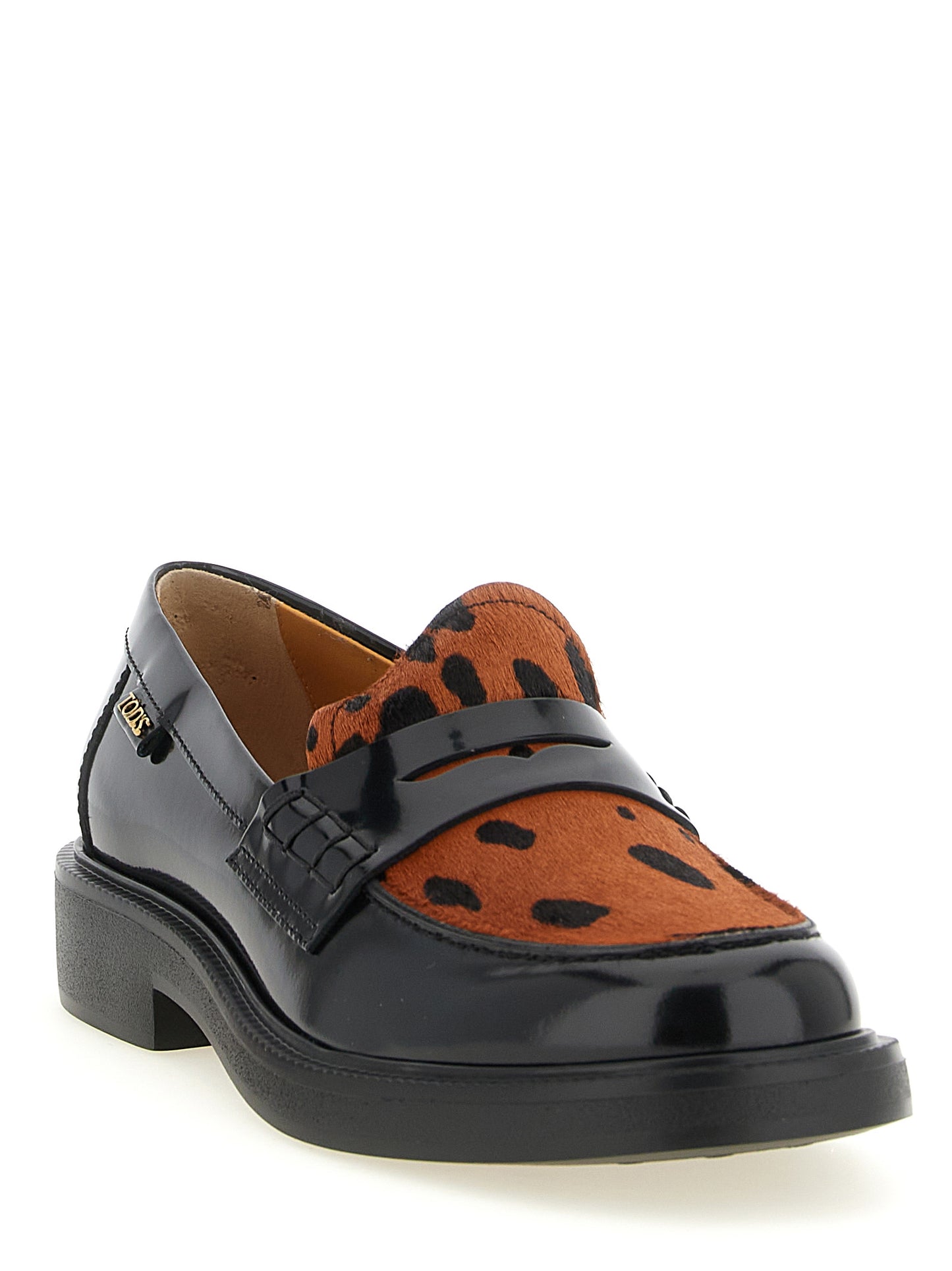 Flat Moccasin Moccasins Loafer Slip-On Shoes by Tod's for women in calfskin leather black, leopard-print, signature & print features an effortless chic silhouette, showcasing the Gommini Pony Women's Calfskin Leather Flat Moccasin Moccasins Loafer Slip-On Shoes design with an effortless chic flat and a for a effortless chic look.