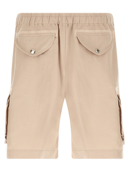 Bermuda Shorts by Brunello Cucinelli for men in linen cotton canvas beige presents a sleek silhouette, featuring a sleek with a refined short and a sophisticated .