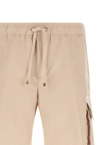 Bermuda Shorts by Brunello Cucinelli for men in linen cotton canvas beige features an nuanced silhouette, showcasing a nuanced with a short cut and for a sophisticated, premium finish.