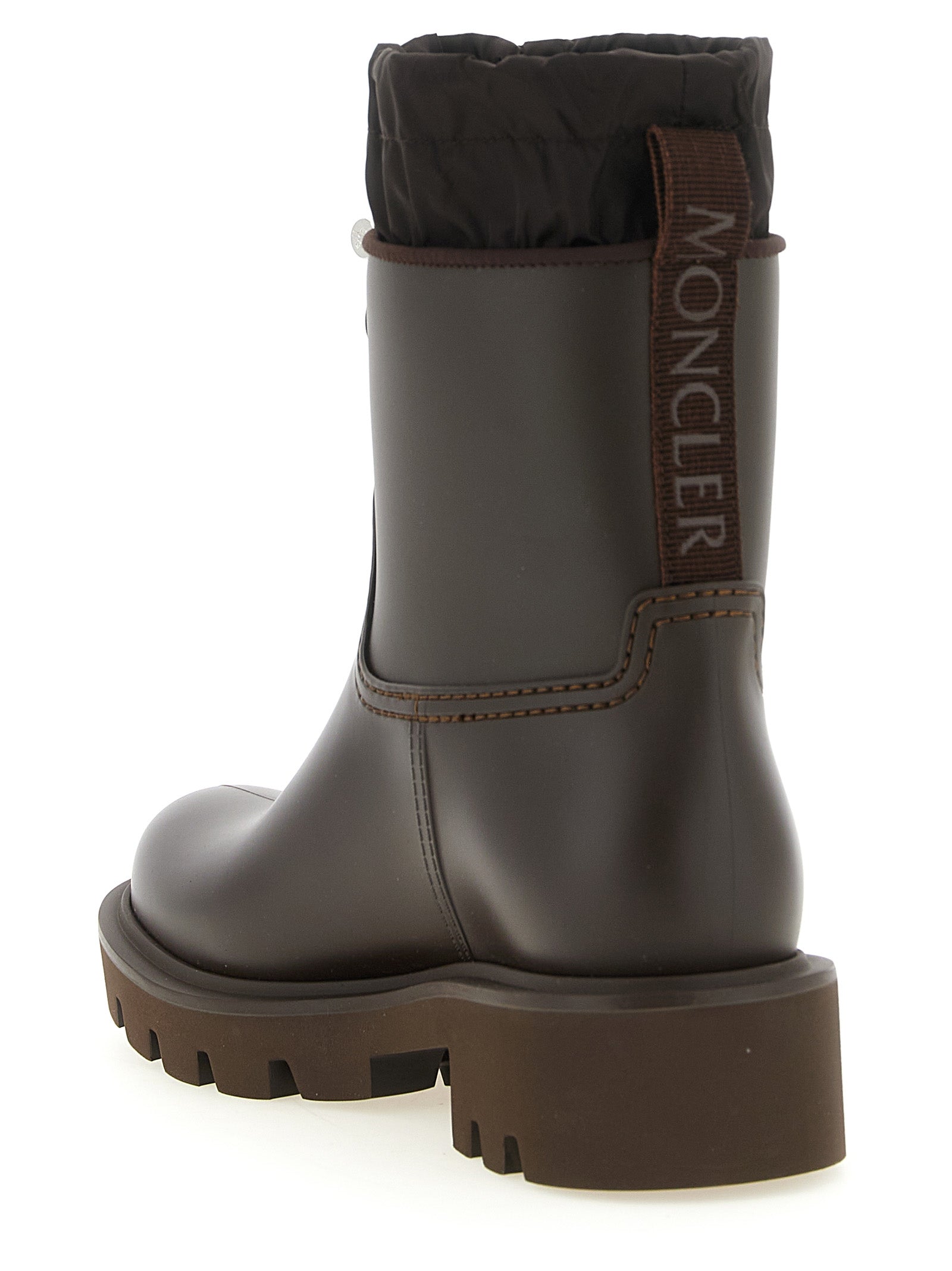 Ankle Boots by Moncler for women in pvc brown & silver features an avant-garde Women's PVC Ankle Boots silhouette, defined by a sophisticated and a avant-garde .