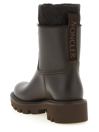 Ankle Boots by Moncler for women in pvc brown & silver features an avant-garde Women's PVC Ankle Boots silhouette, defined by a sophisticated and a avant-garde .