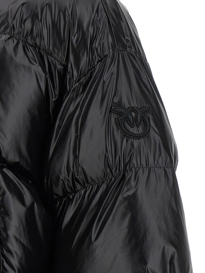 This Hooded Puffer Jacket by PINKO for women in polyamide black exhibits a edgy silhouette, meticulously detailed with functional hooded, insulated & windproof and a edgy for a edgy finish.