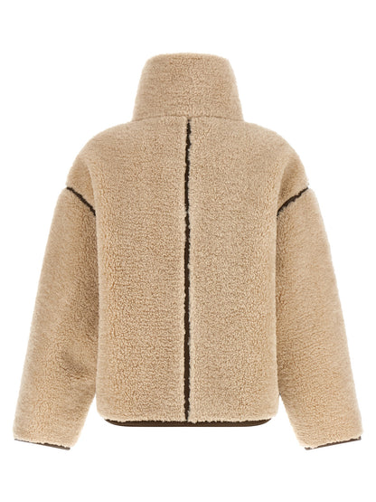 Overcoat by PINKO for women in polyester beige showcases a enveloping silhouette, detailed with distinctive and a enveloping high-neck neckline.
