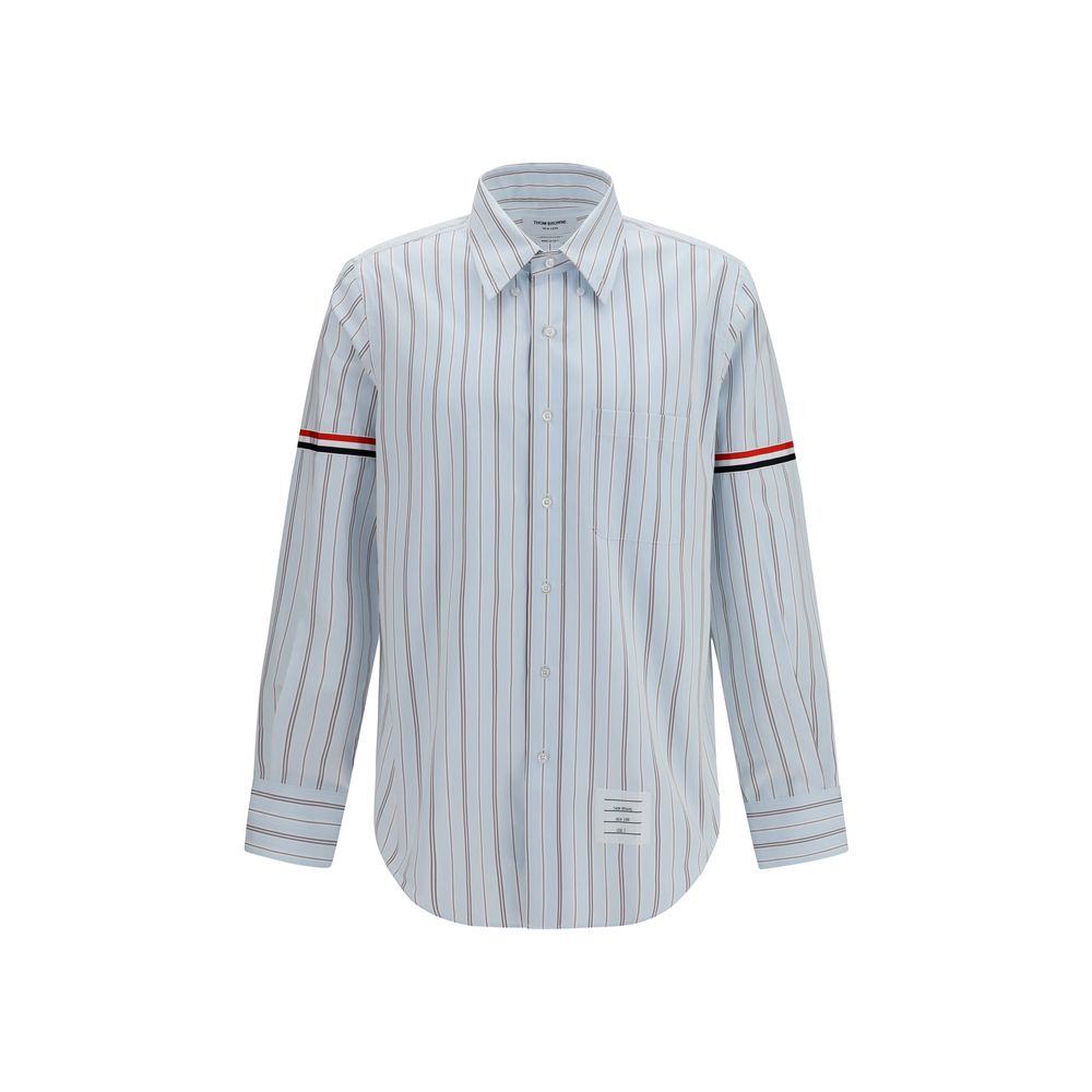 Dress Shirt by Thom Browne for men in cotton blue, signature & striped showcases a sharp silhouette, elegantly detailed with a sharp button-down-collar neckline and sharp .