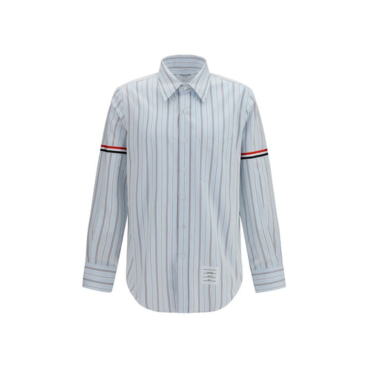 Dress Shirt by Thom Browne for men in cotton blue, signature & striped showcases a sharp silhouette, elegantly detailed with a sharp button-down-collar neckline and sharp .