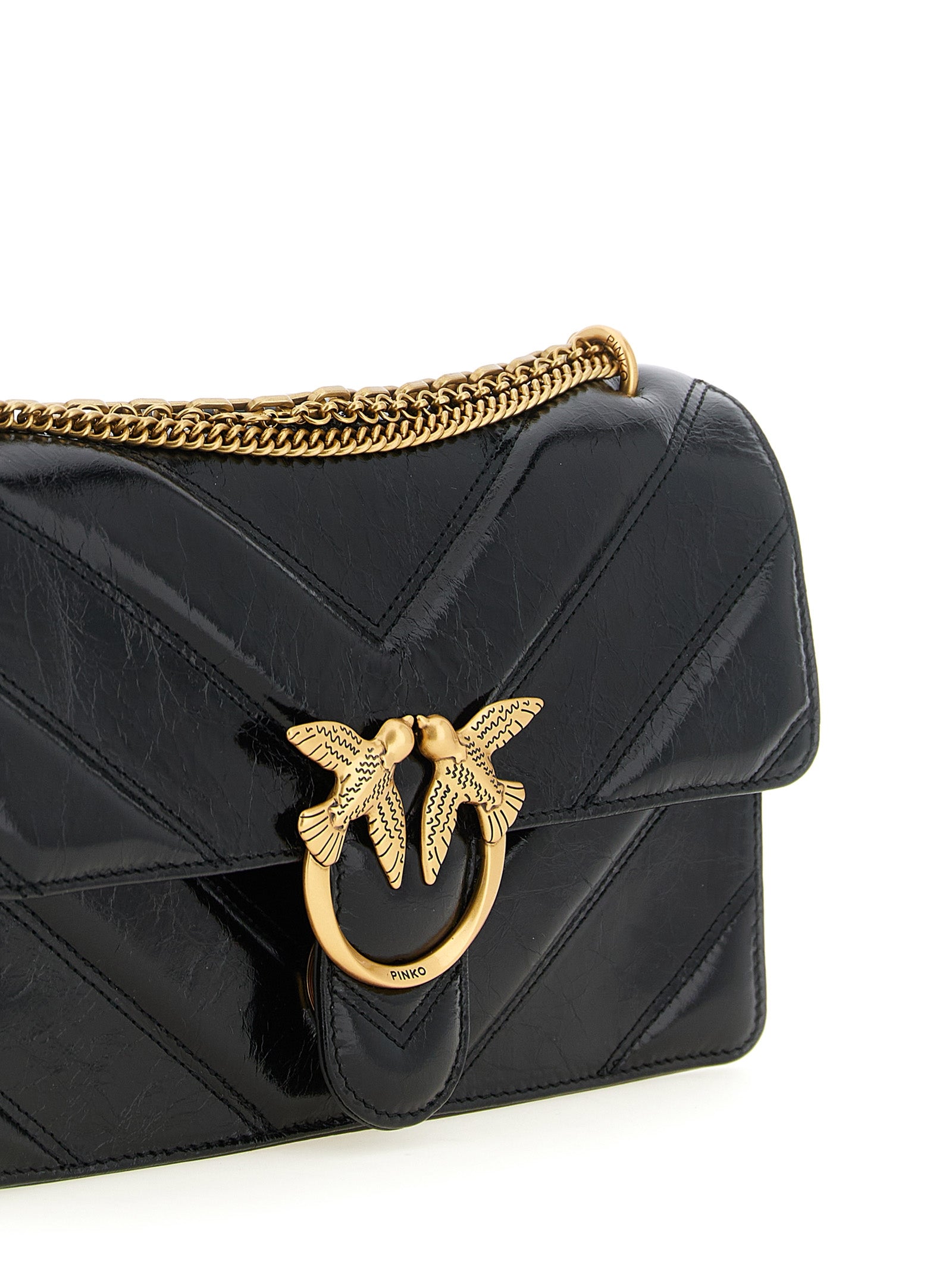Shoulder Bag by PINKO for women in calfskin leather black, gold & chevron features a enviable silhouette, showcasing a secure zipper & buckle, ample , and enviable shoulder-strap for a enviable finish.