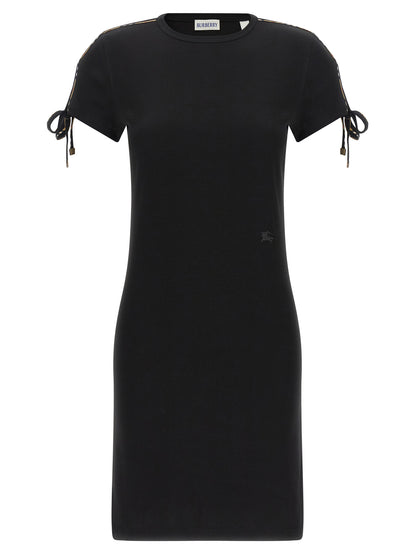 Dress by Burberry for women in stretch cotton black features an sultry silhouette defined by a and short-sleeve, falling to an sultry short for a sultry look.