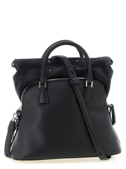 Small 2-in-1 Shoulder & Crossbody Bag by Maison Margiela for women in bos taurus suede calf leather black, silver & signature features a enviable silhouette, showcasing a secure zipper, ample , and enviable crossbody-strap, shoulder-strap, adjustable-strap & handle for a enviable finish.