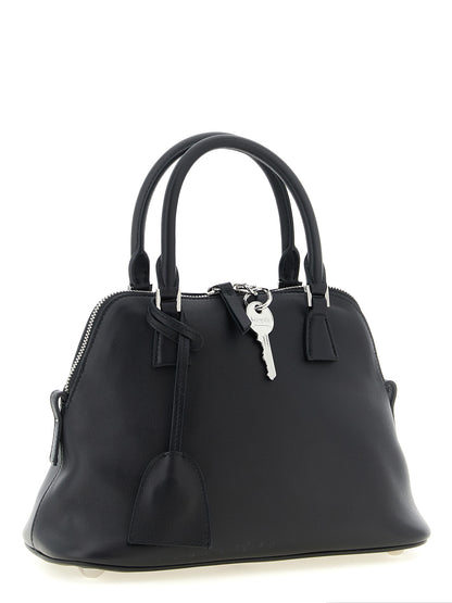 Small 2-in-1 Shoulder & Crossbody Bag by Maison Margiela for women in bos taurus suede calf leather black, silver & signature showcases a enviable silhouette, artfully detailed with a secure zipper, organized , and versatile crossbody-strap, shoulder-strap, adjustable-strap & handle for a enviable look.