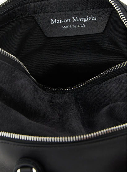 Small 2-in-1 Shoulder & Crossbody Bag by Maison Margiela for women in bos taurus suede calf leather black, silver & signature features a effortless chic silhouette with a secure zipper, ample , and versatile crossbody-strap, shoulder-strap, adjustable-strap & handle for a effortless chic finish.