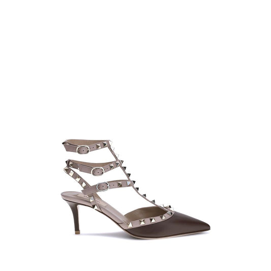 Mid-Heel Stiletto Pumps Heels by Valentino Garavani for women in bos taurus calfskin leather brown features a effortless chic silhouette, showcasing the Rockstud Women's Bos Taurus Calfskin Leather Mid-Heel Stiletto Pumps Heels design with a effortless chic stiletto mid-heel and pointed toe style for a effortless chic finish.