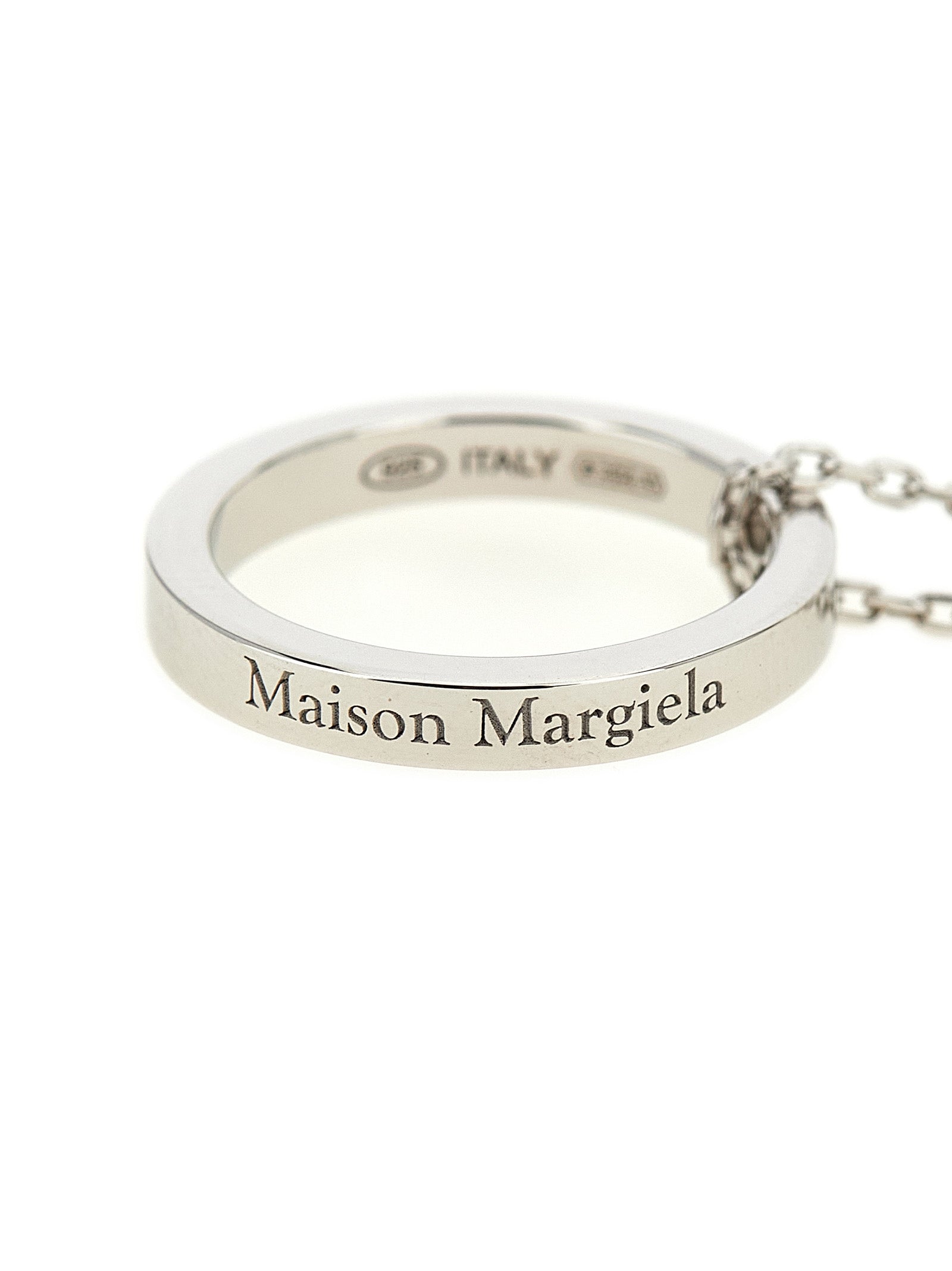Necklace by Maison Margiela for men in wool and silver showcases a radiant silhouette, artfully capturing the elegance of Men's Silver Necklace through its intricate chain pendant statement necklace design.