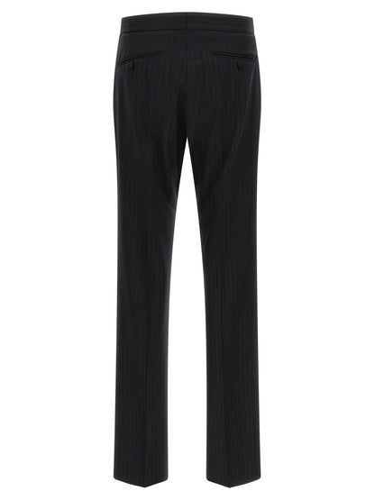 Pant Suit by Tom Ford for men in wool black, pinstripe & striped presents a sharp silhouette, artfully finished with a sharp and a sophisticated straight-leg for a truly sharp look.