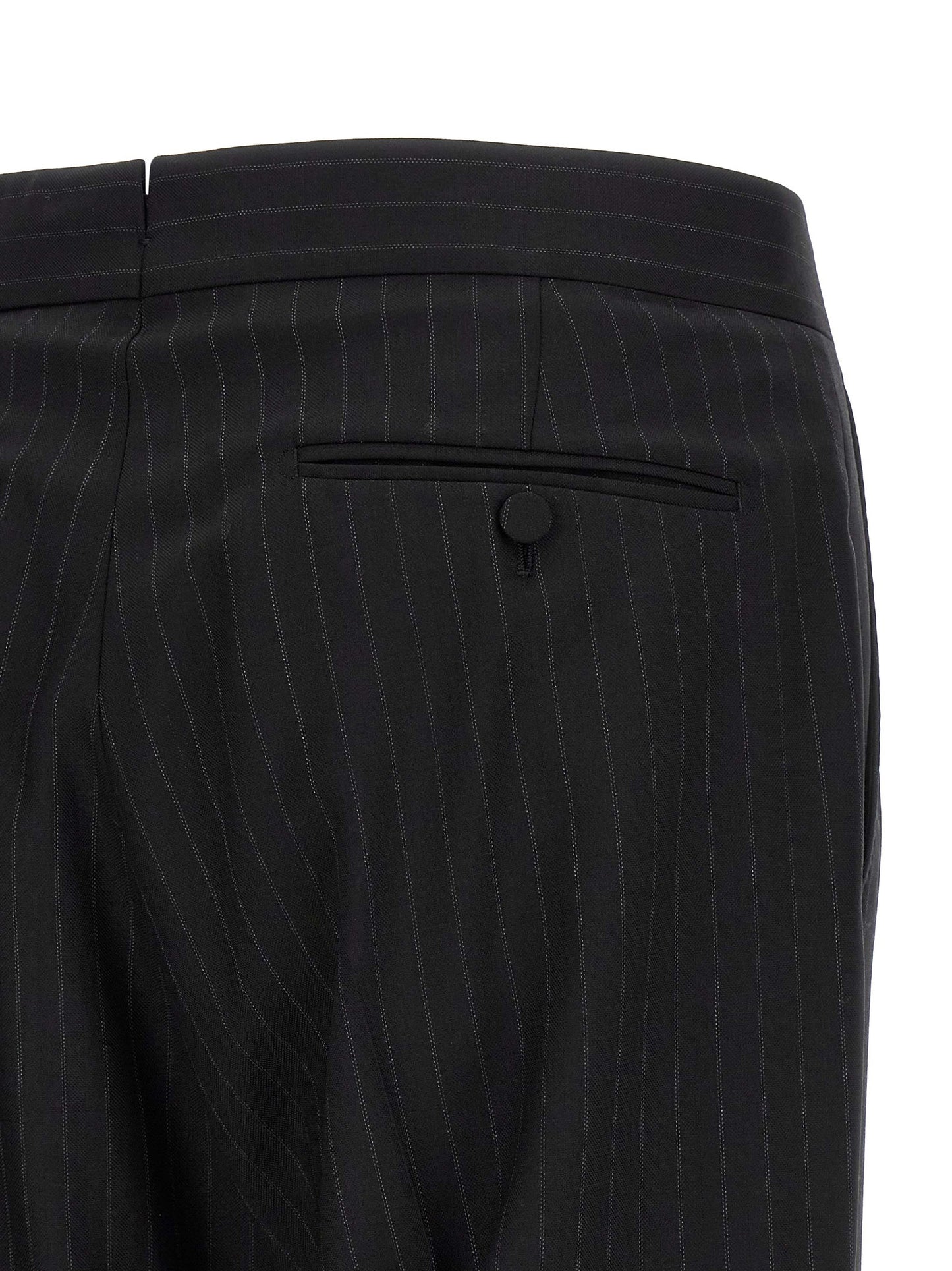 Pant Suit by Tom Ford for men in wool black, pinstripe & striped presents a nuanced silhouette, showcasing a nuanced and nuanced straight-leg for an elevated aesthetic.