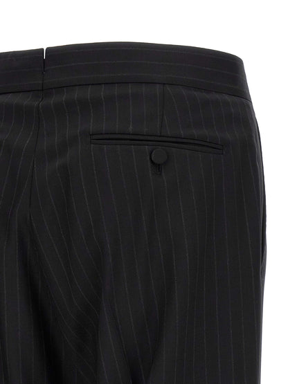 Pant Suit by Tom Ford for men in wool black, pinstripe & striped presents a nuanced silhouette, showcasing a nuanced and nuanced straight-leg for an elevated aesthetic.