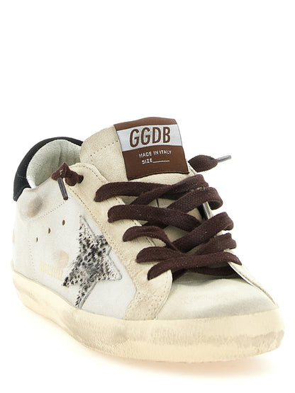 Sneakers by Golden Goose for women in bos taurus suede cowhide leather black, gold, multicolor & white features a chic design, perfectly showcasing the chic low-top style of this Pony Star Women's Low Top Bos Taurus Suede Cowhide Leather Sneakers.
