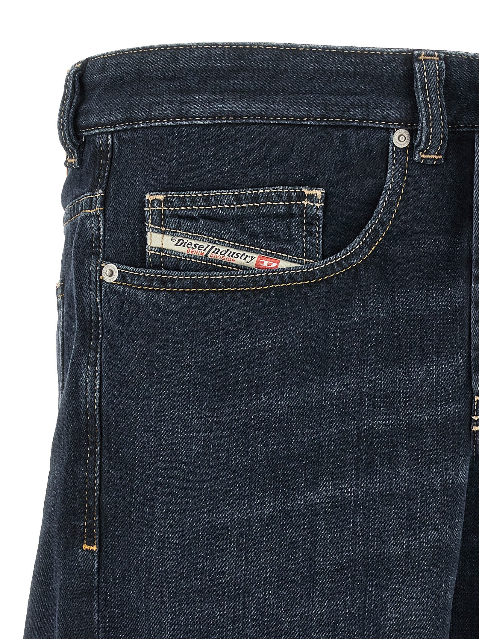 Jeans by Diesel for men in denim cotton dark-blue & signature features a polished silhouette with a polished straight-leg, relaxed-fit & wide, reaching a polished long and finished with a polished .