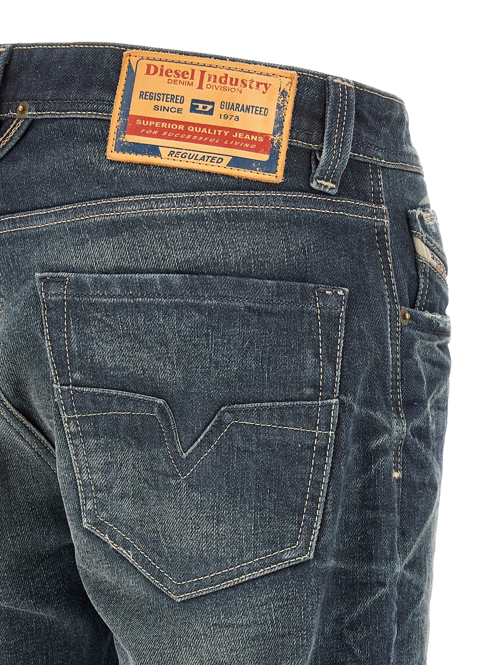 Jeans by Diesel for men in denim cotton & hemp blue features an sartorial straight-leg and long with a cut for a sartorial finish.