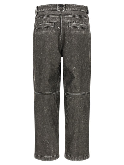 Trousers by Diesel for men in polyethylene polyurethane faux leather dark-gray & gray presents a perennial silhouette, meticulously tailored with a wide cut, long finish, and an elegant .