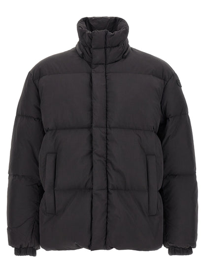 Hooded Puffer Jacket by Diesel for men in polyamide black showcases a bohemian silhouette, artfully detailed with a bohemian hooded high-neck neckline and signature hooded & insulated for a truly bohemian finish.