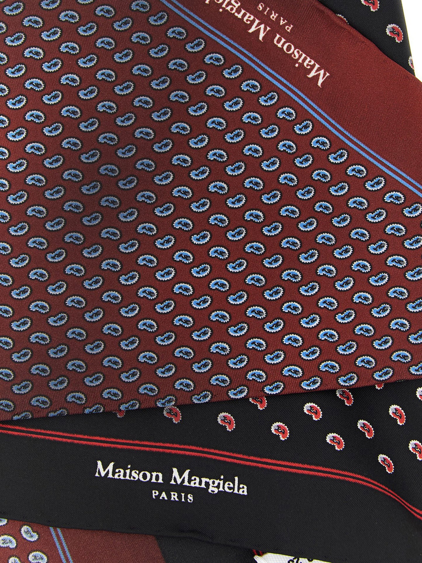 Scarf by Maison Margiela for men in silk black, blue, burgundy, multicolor, red & paisley presents a cosy silhouette, artfully capturing the sophisticated design and premium aesthetic of the Silk Wrap Scarf.