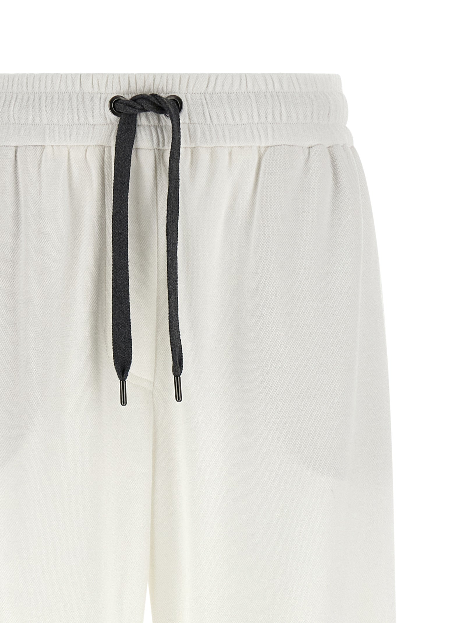Joggers by Brunello Cucinelli for women in polyamide cotton black & white presents a tailored silhouette, showcasing a tailored relaxed-fit & wide and long cut with a refined for a truly tailored aesthetic.