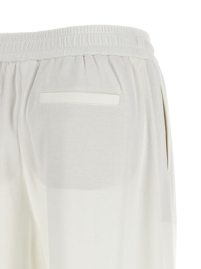 Joggers by Brunello Cucinelli for women in polyamide cotton black & white features a refined silhouette with a refined relaxed-fit & wide, defined by a and a refined long for a refined finish.