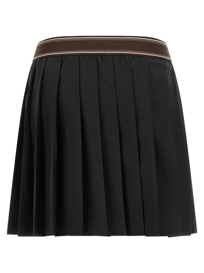 Skirt by Versace for women in mohair wool black, brown, white, jacquard & striped features an relaxed-yet-refined silhouette that elegantly showcases the Medusa Women's Pleated Mohair Wool Skirt design and sophisticated mini long.