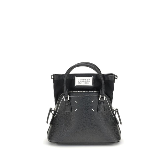 Shoulder Bag by Maison Margiela for women in bos taurus calf leather black, signature & monogram showcases a enviable silhouette, artfully detailed with a secure zipper, organized internal-pockets, and versatile shoulder-strap, handle & adjustable-strap for a enviable look.