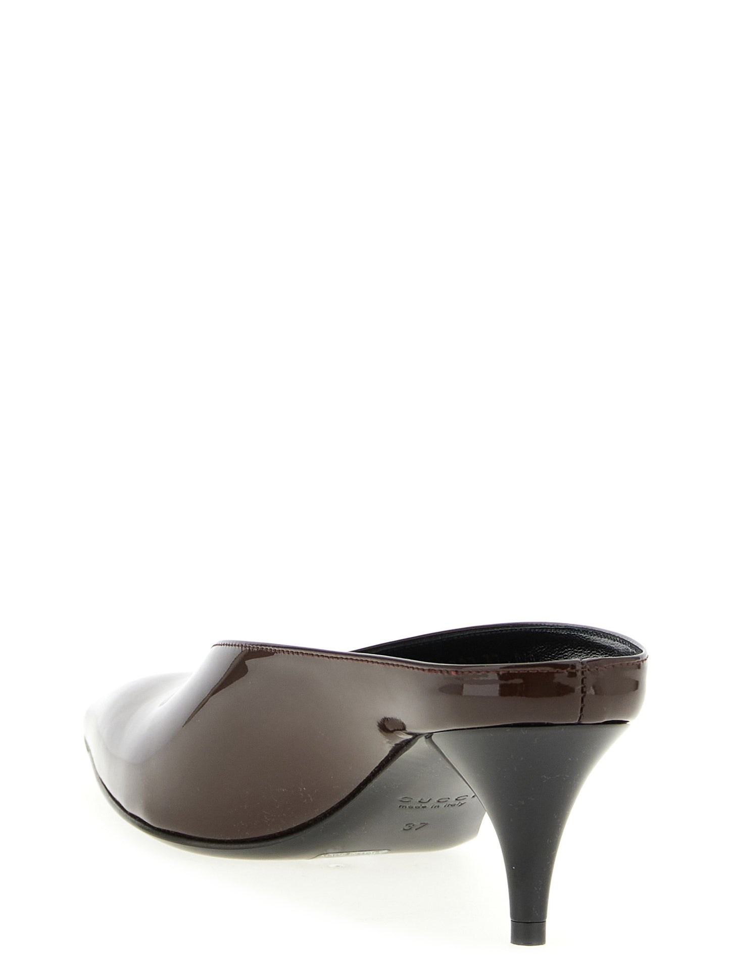 Mid-Heel Mules Pumps Heels by Gucci for women in calfskin leather bordeaux showcases a exquisite silhouette, perfectly accentuating Essence Women's Calfskin Leather Mid-Heel Mules Pumps Heels with a exquisite mid-heel and exquisite pointed toe style.