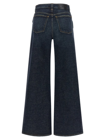 Jeans by Khaite for women in polyurethane leather & cotton denim blue features an sophisticated high rise and flared & wide with a precise long, creating a sophisticated and sophisticated silhouette.